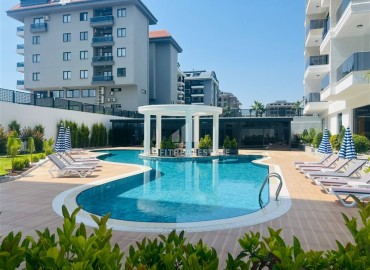 Апартаменты 1+1, 54м², с дизайнерским интерьером в премиум-комплексе в 100м от моря в районе Каргыджак, Алания ID-19266 фото-21