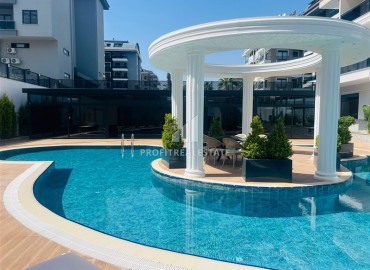 Апартаменты 1+1, 54м², с дизайнерским интерьером в премиум-комплексе в 100м от моря в районе Каргыджак, Алания ID-19266 фото-22