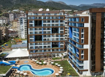 Стильная квартира с одной спальней, 80м², в элитном комплексе в районе Алании – Джикджилли ID-19272 фото-1