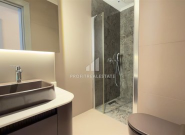 Новая видовая трехкомнатная квартира, 105м², в элитном комплексе на первой береговой линии в Каргыджаке, Алания ID-18938 фото-11