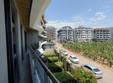 Новая видовая трехкомнатная квартира, 105м², в элитном комплексе на первой береговой линии в Каргыджаке, Алания ID-18938 фото-17