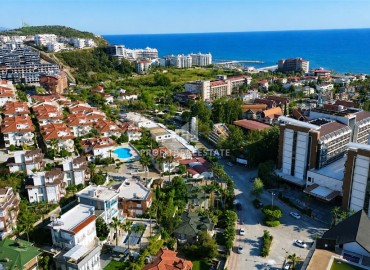 Трехэтажная вилла 4+1, 230м², в комфортабельном комплексе в районе Алании Конаклы, 500м от моря. ID-19275 фото-2