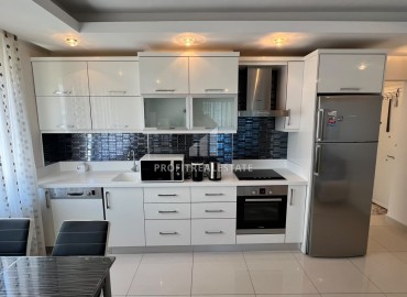 Симпатичная двухкомнатная квартира, 70м², с видом на горы в 200м от моря в Махмутларе, Алания ID-19088 фото-2