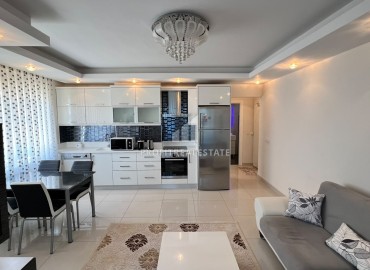 Симпатичная двухкомнатная квартира, 70м², с видом на горы в 200м от моря в Махмутларе, Алания ID-19088 фото-4
