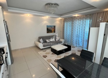 Симпатичная двухкомнатная квартира, 70м², с видом на горы в 200м от моря в Махмутларе, Алания ID-19088 фото-5