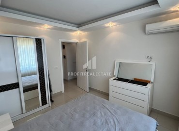 Симпатичная двухкомнатная квартира, 70м², с видом на горы в 200м от моря в Махмутларе, Алания ID-19088 фото-6