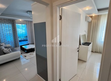 Симпатичная двухкомнатная квартира, 70м², с видом на горы в 200м от моря в Махмутларе, Алания ID-19088 фото-9