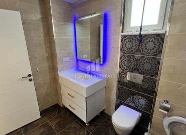 Симпатичная двухкомнатная квартира, 70м², с видом на горы в 200м от моря в Махмутларе, Алания ID-19088 фото-11