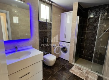 Симпатичная двухкомнатная квартира, 70м², с видом на горы в 200м от моря в Махмутларе, Алания ID-19088 фото-12