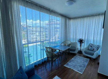 Симпатичная двухкомнатная квартира, 70м², с видом на горы в 200м от моря в Махмутларе, Алания ID-19088 фото-13