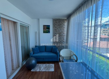 Симпатичная двухкомнатная квартира, 70м², с видом на горы в 200м от моря в Махмутларе, Алания ID-19088 фото-14