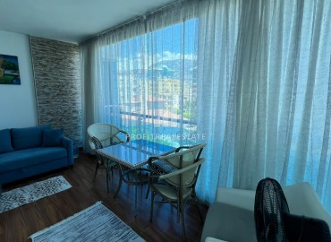 Симпатичная двухкомнатная квартира, 70м², с видом на горы в 200м от моря в Махмутларе, Алания ID-19088 фото-15