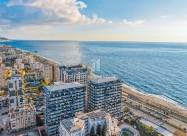 Элегантная двухкомнатная квартира, 60м², в комплексе премиум класса на первой береговой линии в Махмутларе, Алания. ID-19287 фото-1