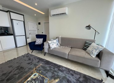 Элегантная двухкомнатная квартира, 60м², в комплексе премиум класса на первой береговой линии в Махмутларе, Алания. ID-19287 фото-3