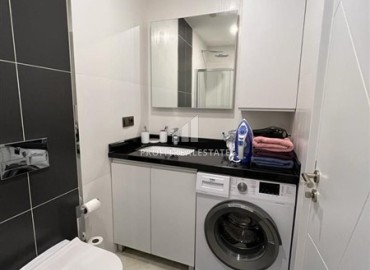 Элегантная двухкомнатная квартира, 60м², в комплексе премиум класса на первой береговой линии в Махмутларе, Алания. ID-19287 фото-7