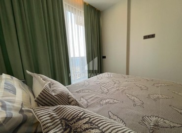 Элегантная двухкомнатная квартира, 60м², в комплексе премиум класса на первой береговой линии в Махмутларе, Алания. ID-19287 фото-10