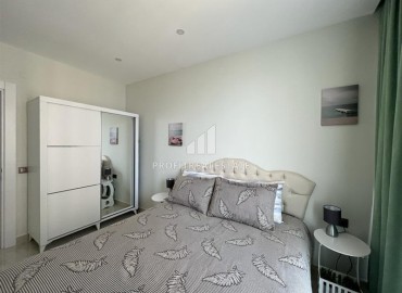Элегантная двухкомнатная квартира, 60м², в комплексе премиум класса на первой береговой линии в Махмутларе, Алания. ID-19287 фото-11