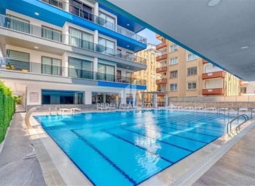 Элегантная двухкомнатная квартира, 60м², в комплексе премиум класса на первой береговой линии в Махмутларе, Алания. ID-19287 фото-14