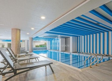 Элегантная двухкомнатная квартира, 60м², в комплексе премиум класса на первой береговой линии в Махмутларе, Алания. ID-19287 фото-15