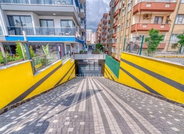 Элегантная двухкомнатная квартира, 60м², в комплексе премиум класса на первой береговой линии в Махмутларе, Алания. ID-19287 фото-23