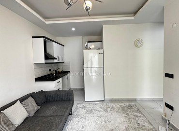 Квартира с одной спальней, 50м², с симпатичным интерьером в комплексе с хорошей инфраструктурой в Махмутларе, Алания ID-19294 фото-4