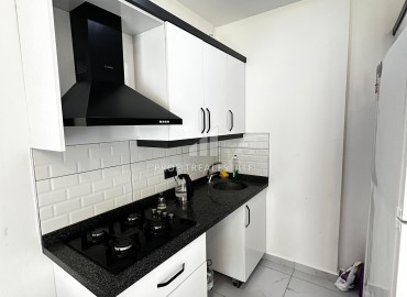 Квартира с одной спальней, 50м², с симпатичным интерьером в комплексе с хорошей инфраструктурой в Махмутларе, Алания ID-19294 фото-6