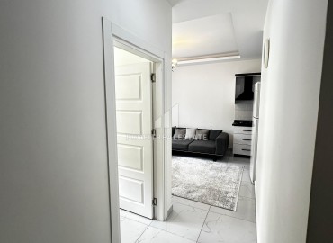Квартира с одной спальней, 50м², с симпатичным интерьером в комплексе с хорошей инфраструктурой в Махмутларе, Алания ID-19294 фото-8