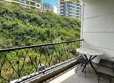 Квартира с одной спальней, 50м², с симпатичным интерьером в комплексе с хорошей инфраструктурой в Махмутларе, Алания ID-19294 фото-13