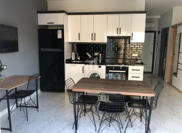 Готовая к проживанию, квартира 1+1, 50м², в комфортабельной резиденции в Махмутларе, Алания ID-19297 фото-2