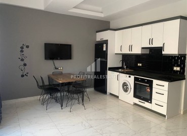 Готовая к проживанию, квартира 1+1, 50м², в комфортабельной резиденции в Махмутларе, Алания ID-19297 фото-9