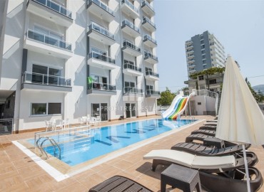 Готовая к проживанию, квартира 1+1, 50м², в комфортабельной резиденции в Махмутларе, Алания ID-19297 фото-16