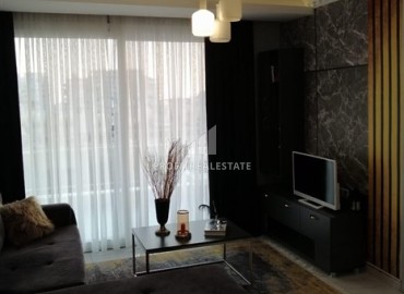 Стильные апартаменты 1+1, 55м², в комфортабельном комплексе на центральной улице Махмутлара, Алания ID-19299 фото-4