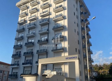 Готовая к проживанию, квартира 1+1, 50м², в комфортабельной резиденции в Махмутларе, Алания ID-19297 фото-1