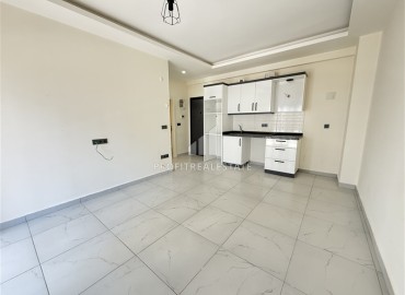 Апартаменты с одной спальней, 55м², в новостройке премиум класса в Махмутларе, Алания ID-19302 фото-2