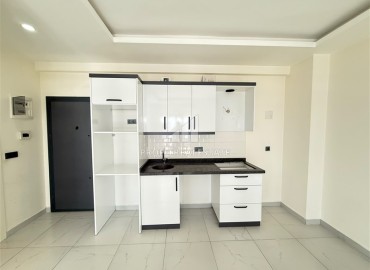Апартаменты с одной спальней, 55м², в новостройке премиум класса в Махмутларе, Алания ID-19302 фото-3