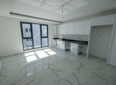 Двухкомнатная квартира, 60м², с чистовой отделкой в новом комплексе с комфортной инфраструктурой в Махмутларе, Алания ID-19305 фото-2