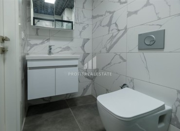Двухкомнатная квартира, 60м², с чистовой отделкой в новом комплексе с комфортной инфраструктурой в Махмутларе, Алания ID-19305 фото-9