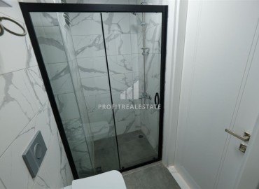 Двухкомнатная квартира, 60м², с чистовой отделкой в новом комплексе с комфортной инфраструктурой в Махмутларе, Алания ID-19305 фото-10