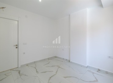 Двухкомнатная квартира, 60м², с чистовой отделкой в новом комплексе с комфортной инфраструктурой в Махмутларе, Алания ID-19305 фото-12
