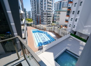 Двухкомнатная квартира, 60м², с чистовой отделкой в новом комплексе с комфортной инфраструктурой в Махмутларе, Алания ID-19305 фото-17