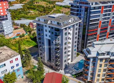 Двухкомнатная квартира, 60м², с чистовой отделкой в новом комплексе с комфортной инфраструктурой в Махмутларе, Алания ID-19305 фото-26