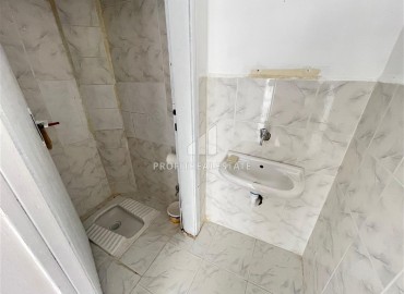 Недорогая вторичная недвижимость: трехкомнатная квартира, 80м², в 200м от моря в Махмутларе, Алания ID-19307 фото-4
