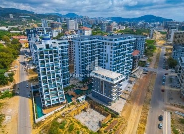Видовой пентхаус с тремя спальнями, 175м², в новом комплексе с отельной инфраструктурой в районе Махмутлар, Алания ID-19311 фото-1