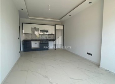 Апартаменты с одной спальней, 55м², в новостройке с хорошей инфраструктурой в 600м от моря в Махмутларе, Алания ID-19315 фото-2