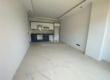Апартаменты с одной спальней, 55м², в новостройке с хорошей инфраструктурой в 600м от моря в Махмутларе, Алания ID-19315 фото-3