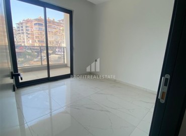 Апартаменты с одной спальней, 55м², в новостройке с хорошей инфраструктурой в 600м от моря в Махмутларе, Алания ID-19315 фото-4