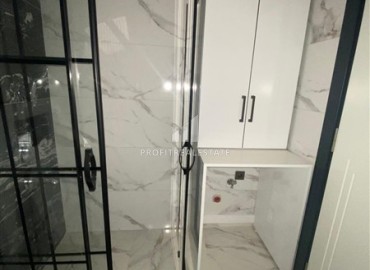 Апартаменты с одной спальней, 55м², в новостройке с хорошей инфраструктурой в 600м от моря в Махмутларе, Алания ID-19315 фото-6