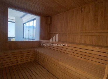 Апартаменты с одной спальней, 55м², в новостройке с хорошей инфраструктурой в 600м от моря в Махмутларе, Алания ID-19315 фото-11