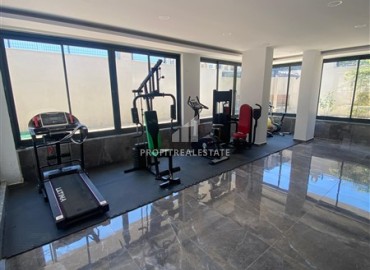 Апартаменты с одной спальней, 55м², в новостройке с хорошей инфраструктурой в 600м от моря в Махмутларе, Алания ID-19315 фото-14