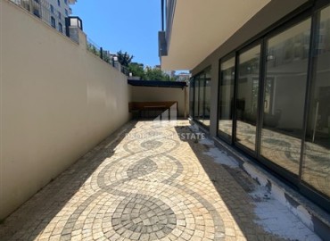 Апартаменты с одной спальней, 55м², в новостройке с хорошей инфраструктурой в 600м от моря в Махмутларе, Алания ID-19315 фото-15